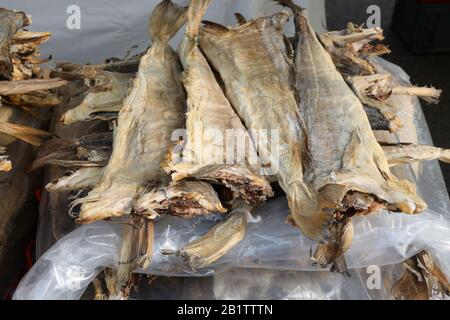 Many dried fish called stockfish for sale at european market Stock