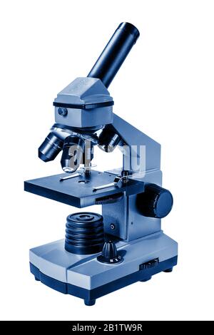 Blue microscope on a white background. microscope toned in trendy Classic Blue color. Science symbol concept. Stock Photo