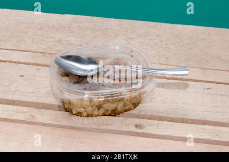 Fast food at the construction site. Food in a plastic container Stock Photo