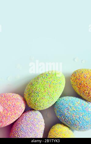 Colored easter eggs on a blue background. Holiday concept Stock Photo