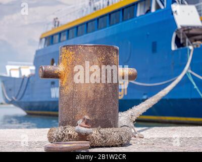 hawser rope keep the boat on the port Stock Photo