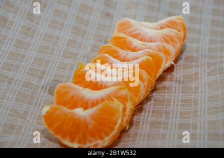 ripe and juicy mandarines tangerine and green leaves Stock Photo