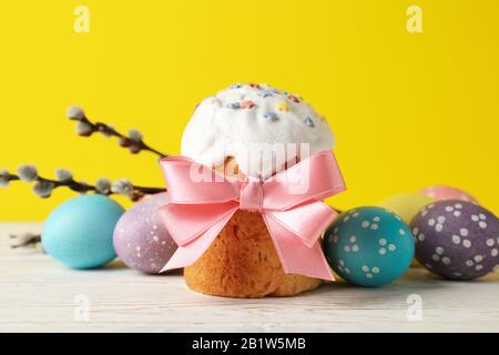 Composition with Easter cake on white wooden table, close up Stock Photo