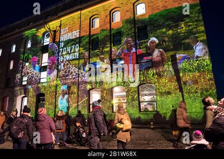 Bristol, UK. 27th Feb, 2020. Local artists light up the City of Bristol with interactive light installations. Pictured is “Wildlife on the Waterfront” on the Arnolfini Gallery by the Charity Send a Cow and Limbic Cinema. The first ever Bristol Light Festival is free to attend, open to all and provided by Bristol BID in partnership with the Bristol City Council and the University of the West of England. Credit: Mr Standfast/Alamy Live News Stock Photo