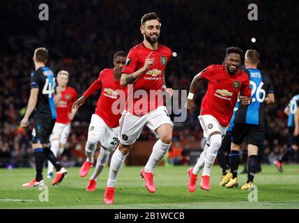 Manchester United's Bruno Fernandes celebrates scoring his sides first goal during the Europa League match at Old Trafford, Manchester. Stock Photo