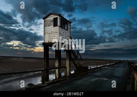 The refuge box on the Holy Island causeway used by motorists who (generally) have ignored the safe crossing times Stock Photo