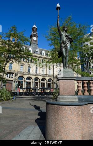 One of the Eight Nymphs in Leeds City Square with the former General Post Office. Stock Photo