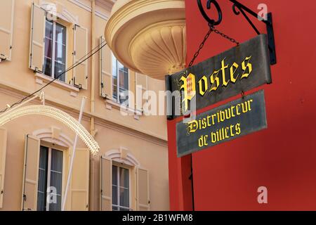 Monaco-Ville / Principality of Monaco - 31.08.2018: Historic post office sign of Monaco on red wall Stock Photo