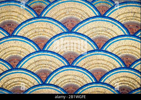 Full frame background of colorful mosaic tiles forming fan shapes Stock Photo