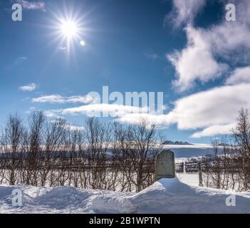 The boundary stone on Sweden Norway state border in mountains, forest glade marking it Stock Photo