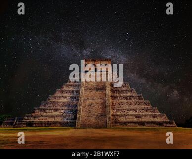 Mayan pyramid of Kukulcan El Castillo in Chichen Itza, Mexico at Night with Milky Way galaxy. A World Heritage Site, it is also one of the New Seven W Stock Photo