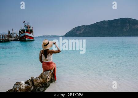 Koh Kham Trat Thailand, people relax on tropical Island Koh Kam Thailand, White beach and coast of the blue sea at Koh kham island at Chonburi Stock Photo