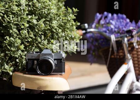 Vintage camera on vintage bike Stock Photo