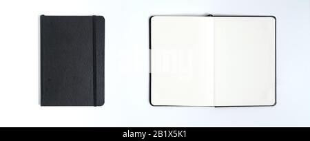 Notebook mock up with clean black blank for design and advertising. Notepad with chromed spring and free copy space template. On the gray background. Stock Photo