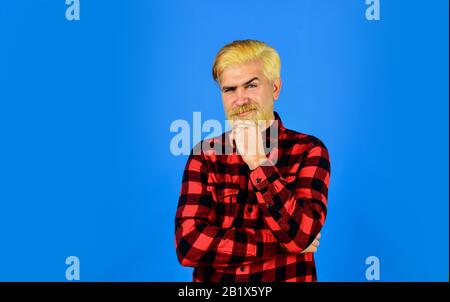 Fashion trend. Hairdresser and barbershop. Coloring beard. Expression of inner you. Moisturise and apply beard oils. Handsome man unshaven face. Bearded man checkered shirt. Hipster dyed beard. Stock Photo