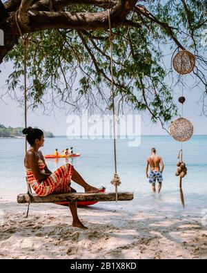 Koh Kham Trat Thailand, people relax on tropical Island Koh Kam Thailand, White beach and coast of the blue sea at Koh kham island at Chonburi Stock Photo