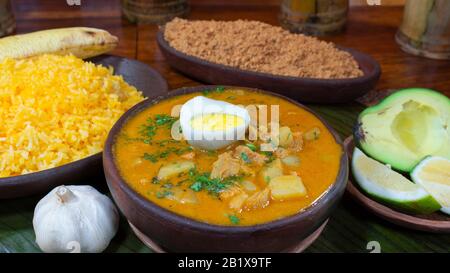 Guatita, typical food of the Ecuadorian coast. This dish consists of a stew made from pieces of beef stomach, decorated with boiled egg and accompanie Stock Photo