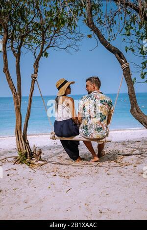 Koh Kham Trat Thailand, people relax on tropical Island Koh Kam Thailand, White beach and coast of the blue sea at Koh kham island at Chonburi Stock Photo