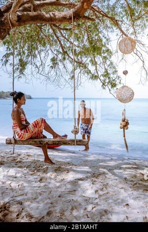 Koh Kham Trat Thailand, people relax on tropical Island Koh Kam Thailand, White beach and coast of the blue sea at Koh kham island at Chonburi Stock Photo