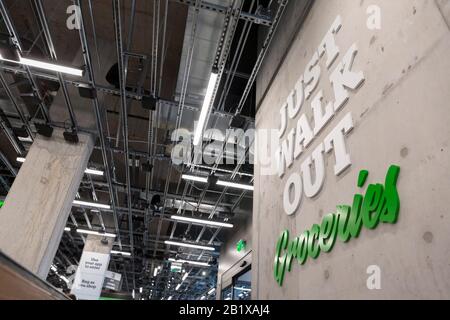 Signage of the Amazon Go Grocery on February 27, 2020. The tech company’s first full-size cashierless supermarket opened in Seattle’s Capitol Hill neighborhood earlier in the week. Customers scan an Amazon Go app to enter the 10,000 square foot store, take the products and go without checking out. Amazon’s “Just Walk Out Technology” uses a complex system of cameras and sensors to track purchases is already in use in their smaller Amazon Go convenience stores. Stock Photo