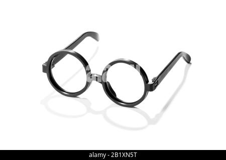 Pair of round vintage plastic reading glasses with black frames casting a shadow on a white background Stock Photo