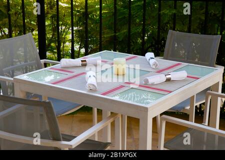 dining table set up in open terrace with beautiful nature view Stock Photo