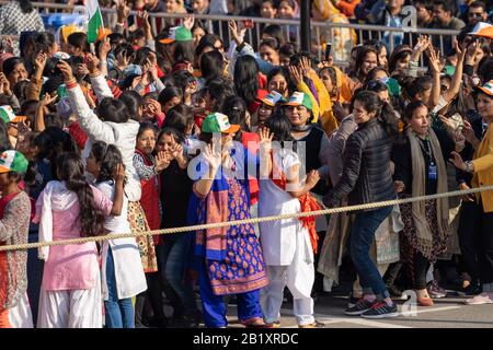 Amritsar, India - Febuary 8, 2020: Indian women dance in the parade at the Wagah Attari Border Closing Ceremony with Pakistan Stock Photo