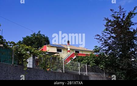 A funny house with a colored chimney (Madeira, Portugal, Europe) Stock Photo