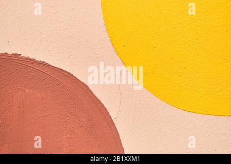 Plaster abstract texture of brown, beige and yellow. Close up. Stock Photo