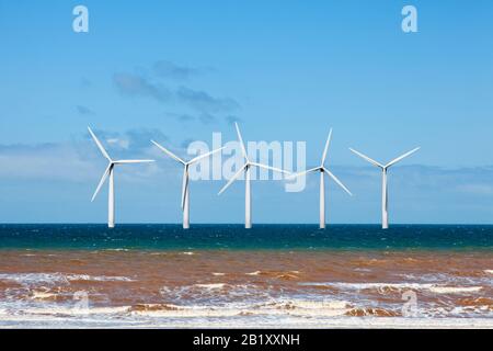 Offshore windfarm, wind turbines in the ocean, (digital composite) Stock Photo