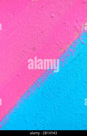 Abstract texture of plaster light shades of pink and blue. Close up. Stock Photo