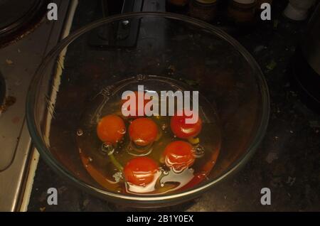 Six cracked eggs Stock Photo