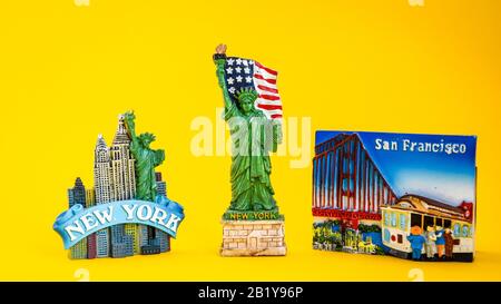 USA with magnets from new york and san francisco on yellow background, travel destination, America travel Stock Photo