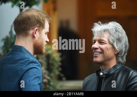Jon Bon Jovi (right) greets the Duke of Sussex at the Abbey Road Studios in London where they will meet members of the Invictus Games Choir. Stock Photo