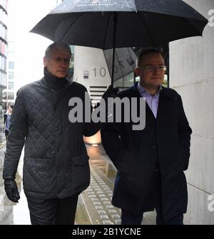 Thomas Kalaris (left) with an unidentified male outside the Old Bailey, London, as he and two other former Barclays senior executives, Roger Jenkins and Richard Boath, have been acquitted of fraud over a £4 billion investment deal with Qatar at the height of the banking crisis. Stock Photo