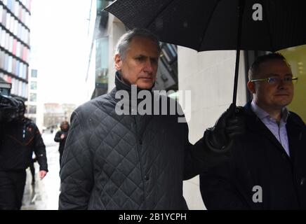 Thomas Kalaris (left) with an unidentified male outside the Old Bailey, London, as he and two other former Barclays senior executives, Roger Jenkins and Richard Boath, have been acquitted of fraud over a £4 billion investment deal with Qatar at the height of the banking crisis. Stock Photo