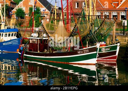 Fish trawler in the harbour Neuharlingersiel, North Sea, Ostfriesland, Frisia, Lower-Saxony, Germany, Europe Stock Photo