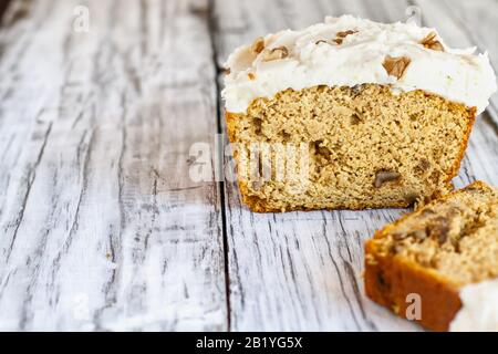 Keto Carrot Cake without the carrots to truly stay in ketosis for Easter. Loaf is baked with almond flour. Sugar free cream cheese icing Stock Photo