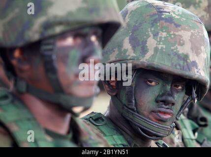 Thai Marines with painted faces participate in an amphibious assault exercise as part of the 'Cobra Gold 2020' (CG20) joint military exercise at the military base in Chonburi, Thailand. Stock Photo