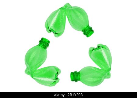 Recyclig symbol made of green plastic bottle on white background Stock Photo