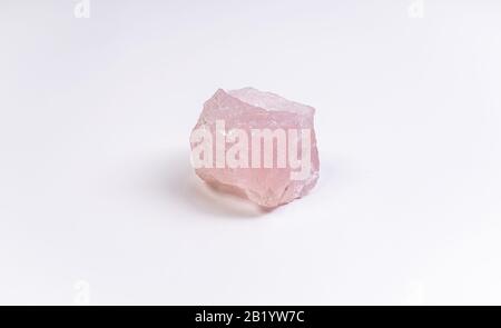 Pink rose quarz crystal isolated on white background Stock Photo