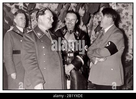 Nazi Archive 1940's Hermann Goering, Heinrich Himmler, and Adolf Hitle rchancellor of Germany in 1933 and then as Führer in 1934 smiling and laughing all wearing military uniform. Stock Photo