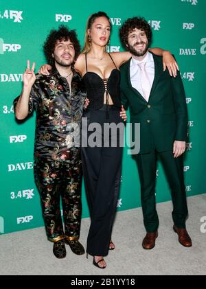 Los Angeles, CA - Feb 27, 2020: Benny Blanco, Elsie Hewitt and Dave Burd attend the premiere of FXX's 'Dave' at Directors Guild Of America Stock Photo