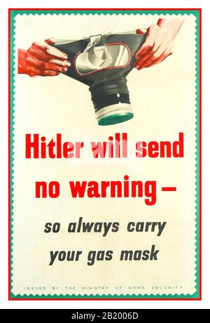 GAS ATTACK British information poster Vintage World War Two Gas Attack warning ‘Hitler will send no warning, so always carry your gas mask’ public information poster by The Ministry of Home Security & HM Stationery Office.  WW2 1940’s Second World War UK Great Britain Stock Photo