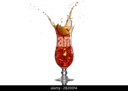 A lemon splashes in a glass of spritz cocktail Stock Photo
