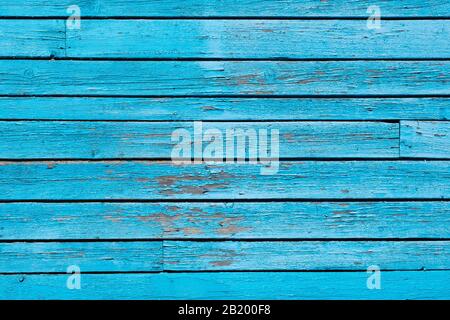 Vintage blue wood background with peeling paint. Stock Photo