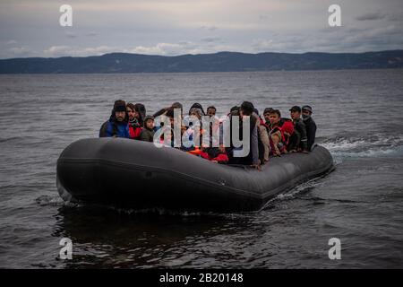 Lesbos, Greece. 28th Feb, 2020. A boat with 54 Afghan refugees, including 24 children, arrives on the Greek island of Lesbos. According to the state news agency Anadolu, a spokesman for the Turkish ruling party AKP has hardly concealed his threat to open the borders for refugees in the country. Credit: Angelos Tzortzinis/dpa/Alamy Live News Stock Photo