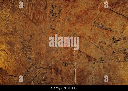 closeup of a golden textured plastered surface to be used as a background Stock Photo