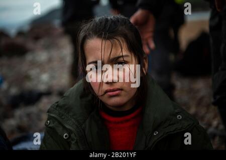 Lesbos, Greece. 28th Feb, 2020. A refugee child from Afghanistan reacts after his arrival on the Greek island of Lesbos. According to the state news agency Anadolu, a spokesman for the Turkish ruling party AKP has hardly concealed his threat to open the borders for refugees in the country. Credit: Angelos Tzortzinis/dpa/Alamy Live News Stock Photo