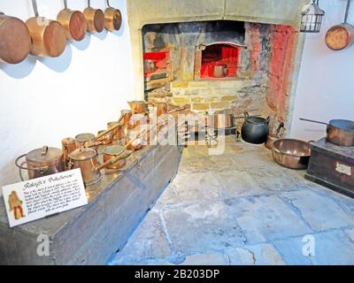 Raleigh's Bakehouse in the cellars of Sherborne 'New' Castle complete with copper pots and pans, Sherborne, Dorset, England, UK Stock Photo